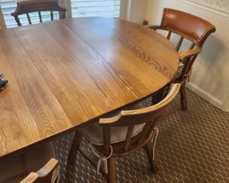 Oak dining table and 6 chairs