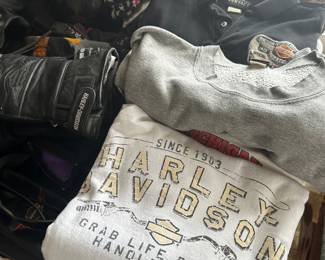 This ENTIRE table is filled with Harley Davidson items! Clothes, Parts, Accessories!