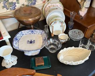 Back in the dining room for a banquet table full of vintage china, silverware and assorted tchotchkes!