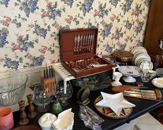 Back in the dining room for a banquet table full of vintage china, silverware and assorted tchotchkes!