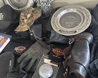 This ENTIRE table is filled with Harley Davidson items! Clothes, Parts, Accessories!