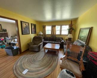 Couch, chairs, rugs, tables, decor, pictures, lamps