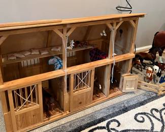 Large wood play horse barn with horses