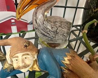Hand blown glass pelican and clay gnome figurine
