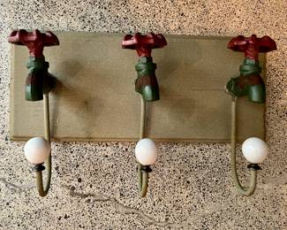 Faucet coat hangers