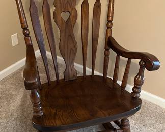 Dark wood rocking chair