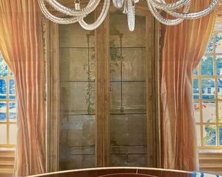 French Renaissance hand painted walnut china cabinet with antique glass.