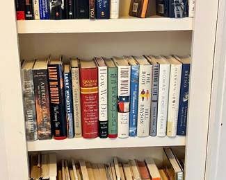 LOTS OF BOOKS EVERYWHERE.