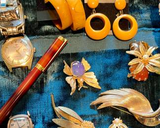 Vintage Bakelite earrings and brooches