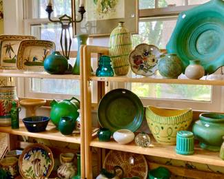 LOTS OF GREEN AND YELLOW POTTERY.