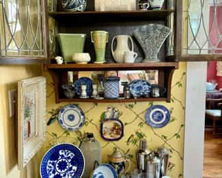 BAR AREA WITH MORE POTTERY, BLUE AND WHITE.