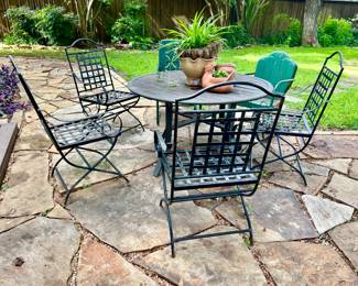 wrought iron patio table and 4 chairs.