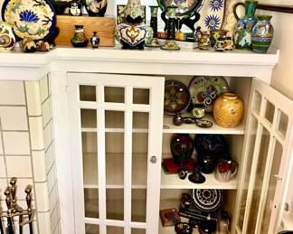 TWO AREAS FULL OF GOUDA POTTERY.