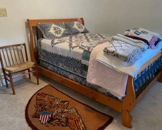 Seigh bed, Scandanavian chair, handmade rug, handmade quilts