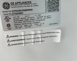 GE top freezer fridge.