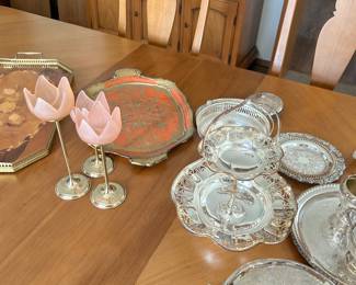 Frosted pink tulip italian candlesticks and sterling silver serving plates.