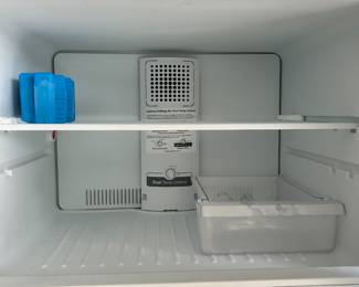 GE top freezer fridge.