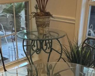 $60 Round glass top table with Green iron legs 24 round 30T