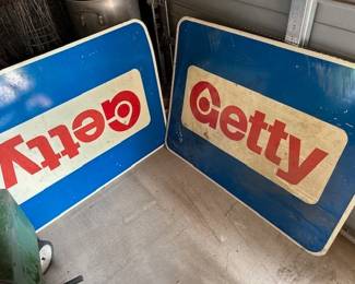 Two Getty gas station signs. Metal.