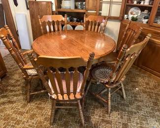 Oak claw footed table. Has leaf in great shape. Nice piece.