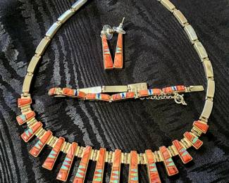 Gorgeous Spiney Oyster and silver necklace designed by artisan Calvin Begay. an award winning Navajo artist who Uses only the finest quality Stones for his creations.