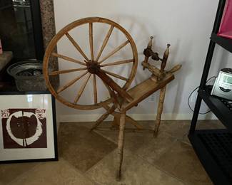 Antique spinning wheel. There are two of these.
