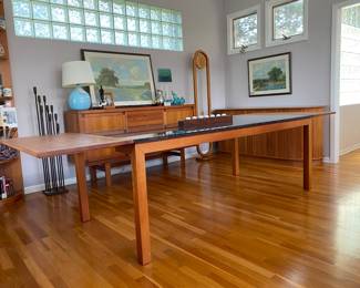 Fabulous grey / black granite topped, teak, dining table with hidden extensions. Gretoma, made in Denmark 120.5” fully extended 80.5 without 