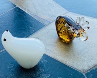 Glass items from travels to Antarctica and Alaska