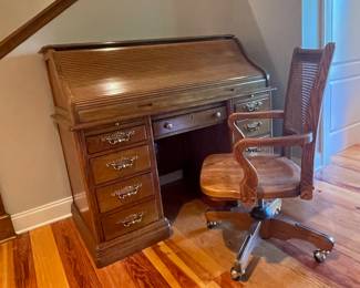 Oak roll-top desk and oak cane back chair