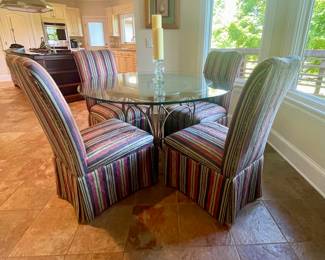 Round metal/glass table with 4 upholstered chairs