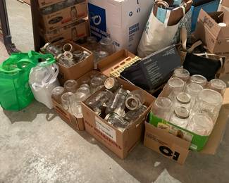 Lots of canning jars: quarts, pints, jelly and others... 2 cases of lids.