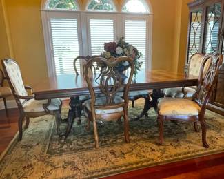 Thomasville flame mahogany dining room table with 6 chairs, Shaw rug...