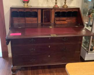 Antique slant front desk, leather writing pad.