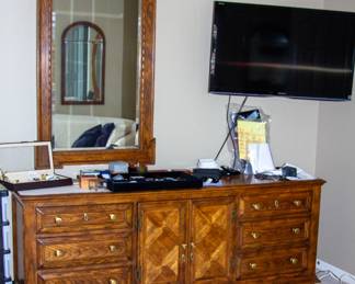 Beautiful wooden dresser, mirror, and Sony TV