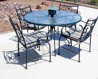 Outdoor glass top table and chairs(x4)