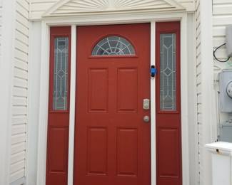 Entry door with two side lights
