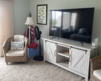 Rustic TV console; floor lamp