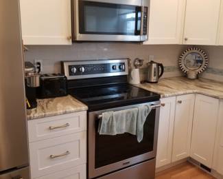 Maytag electric range; Maytag microwave oven mfg. March 2017