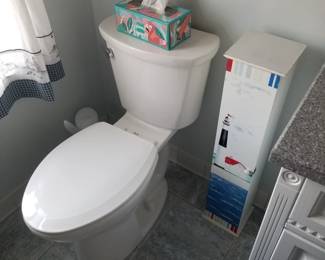 Updated commode; toilet paper tower