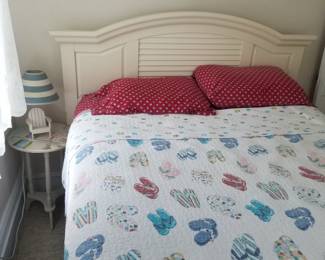 Coastal chic queen bed by Broyhill; accent table; table lamp