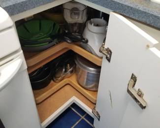 Each kitchen has a corner cabinet