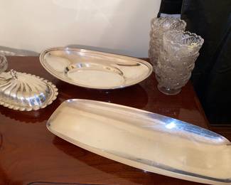Some of the silver plate serving pieces 