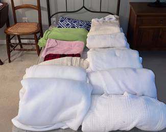 1 of 2 metal headboard beds and a nice assortment of bedding and linens