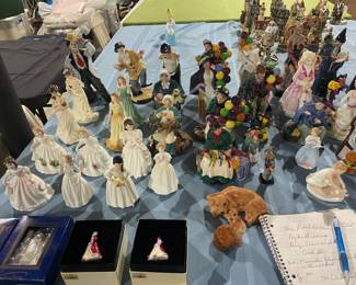 . . .  a great assortment of Royal Doulton figures