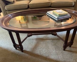 Oval coffee table with glass top