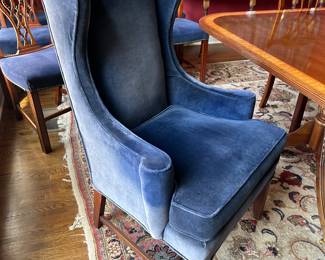 1 Upholstered wing chair used in dining room