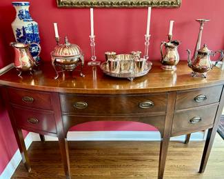 Bowfront sideboard. Left is cabinet door, right are 2 drawers. 