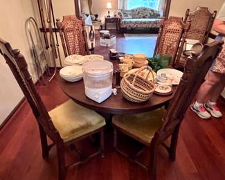 Pedestal dining table and 6 cane and velvet chairs- $400