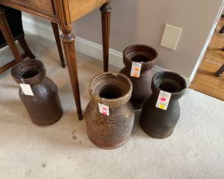 Old Drain Pipes painted by local artist. Great for plant stands.