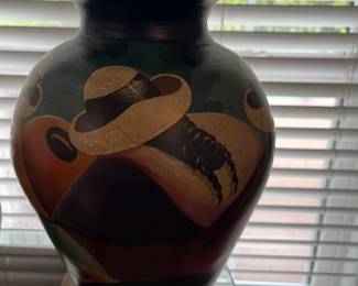 2 different size hand painted Peruvian pots